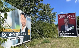 An der Blase-Kreuzung in Lübbecke präsentieren sich die Bürgermeisterkandidaten von CDU und SPD, Bent-Maria Grote (l.) und Philipp Knappmeyer auf großen Wahlplakaten. - Heike von Schulz An der Blase-Kreuzung in Lübbecke präsentieren sich die Bürgermeisterkandidaten von CDU und SPD, Bent-Maria Grote (l.) und Philipp Knappmeyer auf großen Wahlplakaten. - Heike von Schulz