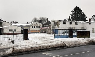 Auf dem Gelände eines früheren Reifenhandels an der Ahmser Straße 7-9 soll ein Mehrfamilienhaus entstehen. - Frank-Michael Kiel-Steinkamp Auf dem Gelände eines früheren Reifenhandels an der Ahmser Straße 7-9 soll ein Mehrfamilienhaus entstehen. - Frank-Michael Kiel-Steinkamp