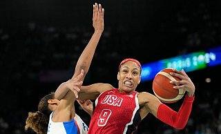Die US-Basketballerinnen um A\'ja Wilson haben in Paris Gold gewonnen. - Mark J. Terrill/AP Die US-Basketballerinnen um A\'ja Wilson haben in Paris Gold gewonnen. - Mark J. Terrill/AP