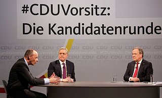 Friedrich Merz (v. l.), Norbert Röttgen und Armin Laschet kämpfen um den Posten als Parteivorsitzender der CDU. - Reuters Friedrich Merz (v. l.), Norbert Röttgen und Armin Laschet kämpfen um den Posten als Parteivorsitzender der CDU. - Reuters