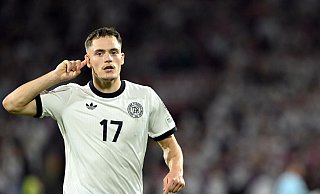 Florian Wirtz jubelt nach seinem Freistoßtor. - Federico Gambarini/dpa Florian Wirtz jubelt nach seinem Freistoßtor. - Federico Gambarini/dpa