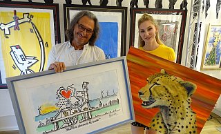 "Magische Momente am Monte": Herman Reichold und seine Assistentin Lara Wenzel geben schon vor Beginn von Libori einen exklusiven Blick auf das diesjährige Li(e)boribild frei. Lara Wenzel stellt in diesem Jahr zum ersten Mal ein eigenes Werk mit aus. - Kristina Grube "Magische Momente am Monte": Herman Reichold und seine Assistentin Lara Wenzel geben schon vor Beginn von Libori einen exklusiven Blick auf das diesjährige Li(e)boribild frei. Lara Wenzel stellt in diesem Jahr zum ersten Mal ein eigenes Werk mit aus. - Kristina Grube