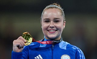 Meolie Jauch präsentiert stolz ihre Goldmedaille. - Hendrik Schmidt/dpa Meolie Jauch präsentiert stolz ihre Goldmedaille. - Hendrik Schmidt/dpa