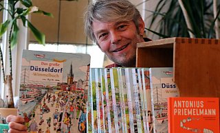 Mit seinen Wimmelbüchern hat Roland Siekmann sich einen Namen gemacht. Düsseldorf ist gerade zusammen mit Essen erschienen. - Wolfgang Rudolf Mit seinen Wimmelbüchern hat Roland Siekmann sich einen Namen gemacht. Düsseldorf ist gerade zusammen mit Essen erschienen. - Wolfgang Rudolf