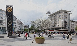 Eine Felsenbirne in einem Kübel: An vier Standorten auf dem Jahnplatz sollen die Gewächse aufgestellt werden. Die Visualisierung vermittelt einen Eibdruck davon, wie das Erscheinungsbild dann sein könnte. - Stadt Bielefeld Eine Felsenbirne in einem Kübel: An vier Standorten auf dem Jahnplatz sollen die Gewächse aufgestellt werden. Die Visualisierung vermittelt einen Eibdruck davon, wie das Erscheinungsbild dann sein könnte. - Stadt Bielefeld