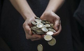 Größere Bargeldsummen oder Scheine erbeutete der Bankräuber nicht. - dpa Größere Bargeldsummen oder Scheine erbeutete der Bankräuber nicht. - dpa