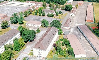 Drei Gebäude der ehemaligen Dempsey-Kaserne werden seit dem Frühjahr 2022 als Notunterkunft für Geflüchtete des Landes NRW genutzt. - (Archivbild) Besim Mazhiqi Drei Gebäude der ehemaligen Dempsey-Kaserne werden seit dem Frühjahr 2022 als Notunterkunft für Geflüchtete des Landes NRW genutzt. - (Archivbild) Besim Mazhiqi