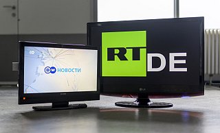 Auch in Deutschland beteiligt sich RT DE intensiv am russischen Vorhaben, die ukrainische Regierung als Aggressor und Russland als friedlichen Beschützer darzustellen. - picture alliance / Geisler-Fotopress Auch in Deutschland beteiligt sich RT DE intensiv am russischen Vorhaben, die ukrainische Regierung als Aggressor und Russland als friedlichen Beschützer darzustellen. - picture alliance / Geisler-Fotopress