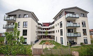 Das Generationenwohnhaus wurde mit einem charmanten Innenhof geplant. Hier ist Platz für die 40 jungen und älteren Bewohner zum Treffen, Verweilen und Spielen. - Oliver Krato Das Generationenwohnhaus wurde mit einem charmanten Innenhof geplant. Hier ist Platz für die 40 jungen und älteren Bewohner zum Treffen, Verweilen und Spielen. - Oliver Krato
