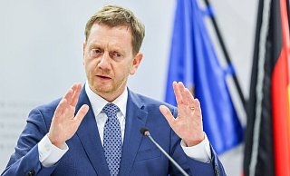 Michael Kretschmer (CDU), Ministerpräsident von Sachsen, bei in einer Pressekonferenz. - Foto: Jan Woitas/dpa-Zentralbild/dpa Michael Kretschmer (CDU), Ministerpräsident von Sachsen, bei in einer Pressekonferenz. - Foto: Jan Woitas/dpa-Zentralbild/dpa