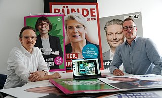 Tobias Uffmann (l.) und Tim Perlemann von der Bünder Agentur "Kirchner" nahmen die Wahlplakate der Bünder Bürgermeisterkandidatinnen und -kandidaten einmal aus Marketingsicht genau unter die Lupe. - Gerald Dunkel Tobias Uffmann (l.) und Tim Perlemann von der Bünder Agentur "Kirchner" nahmen die Wahlplakate der Bünder Bürgermeisterkandidatinnen und -kandidaten einmal aus Marketingsicht genau unter die Lupe. - Gerald Dunkel