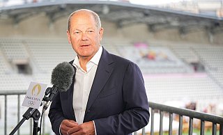 Olaf Scholz sieht Frankreich als Inspiration für eine Olympia-Bewerbung. - Michael Kappeler/dpa Olaf Scholz sieht Frankreich als Inspiration für eine Olympia-Bewerbung. - Michael Kappeler/dpa